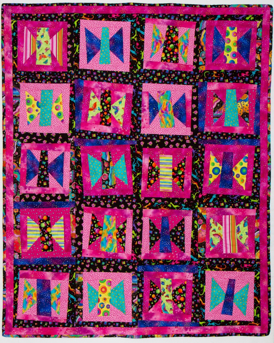 Pink wonky butterfly quilt